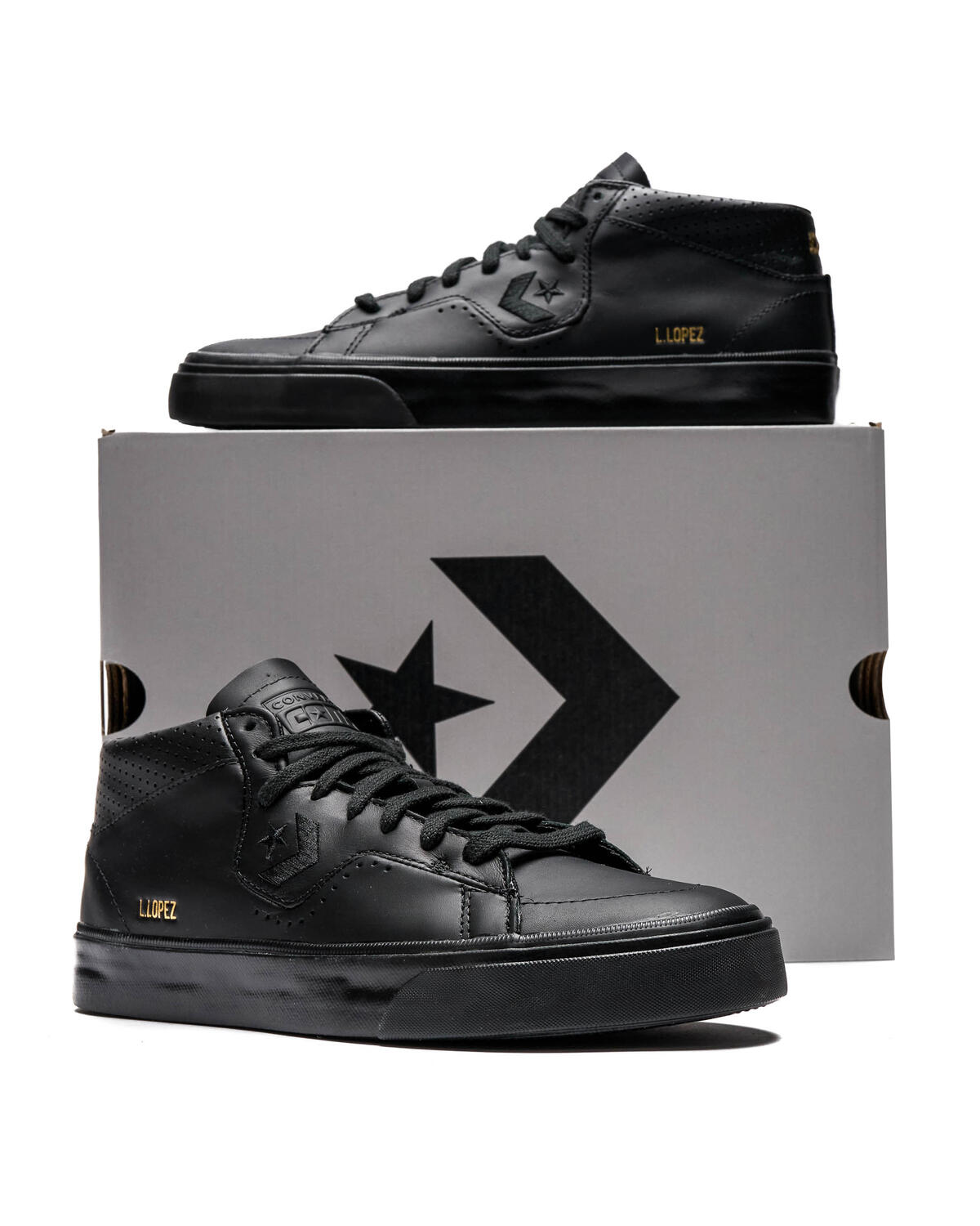 Converse rival leather shop mid top